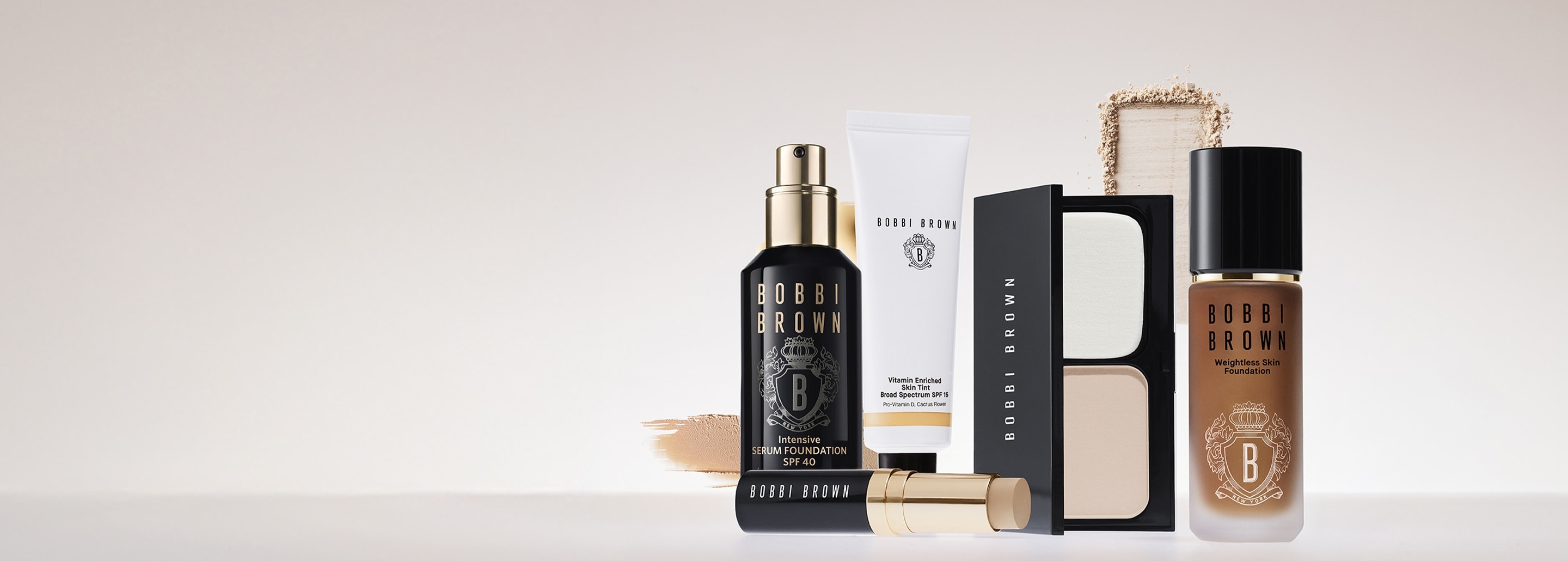 A selection of foundations on a neutral background