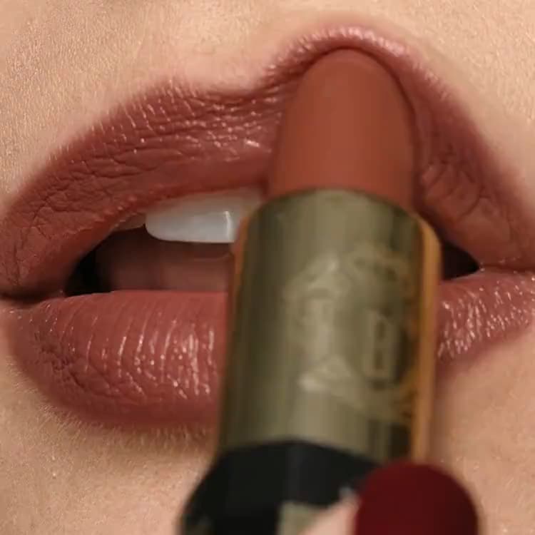 Video showcasing model applying new Luxe Lip Color