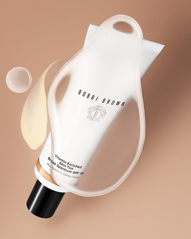 Vitamin Enriched Skin Tint surrounded by ingredient swatches on a light, skin tone background