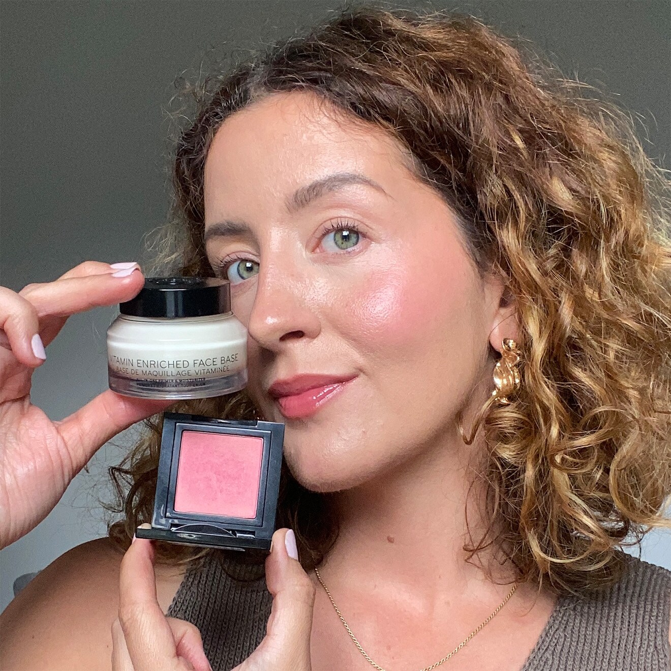 Video showing pro artist applying blush and vitamin enriched face base